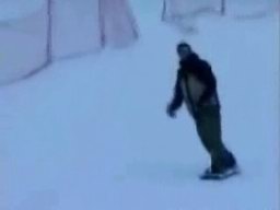 Snowboarder Crashes Into Cameraman